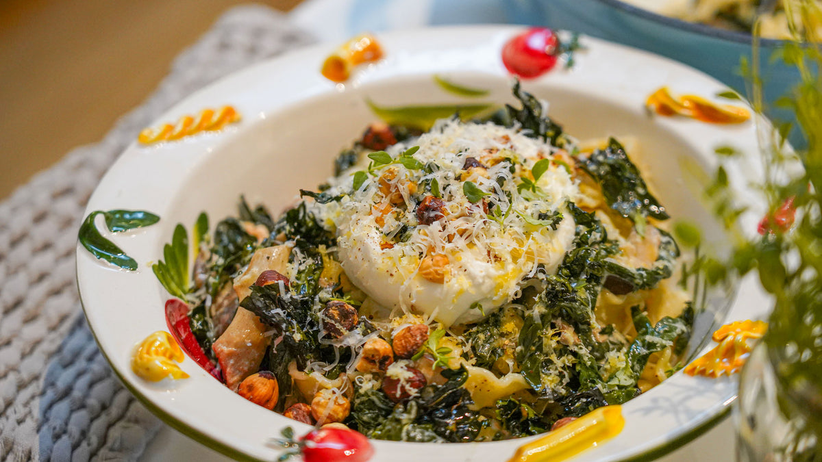 Pasta met paddenstoelen, palmkool, citroen & burrata