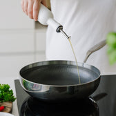 Wok op het fornuis 